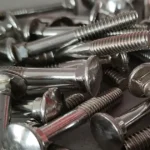 Pile of zinc plated stainless steel carriage bolts showing round heads and square necks