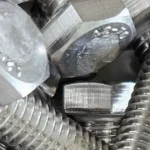 Bulk pile of stainless steel hex bolts for industrial fastening applications